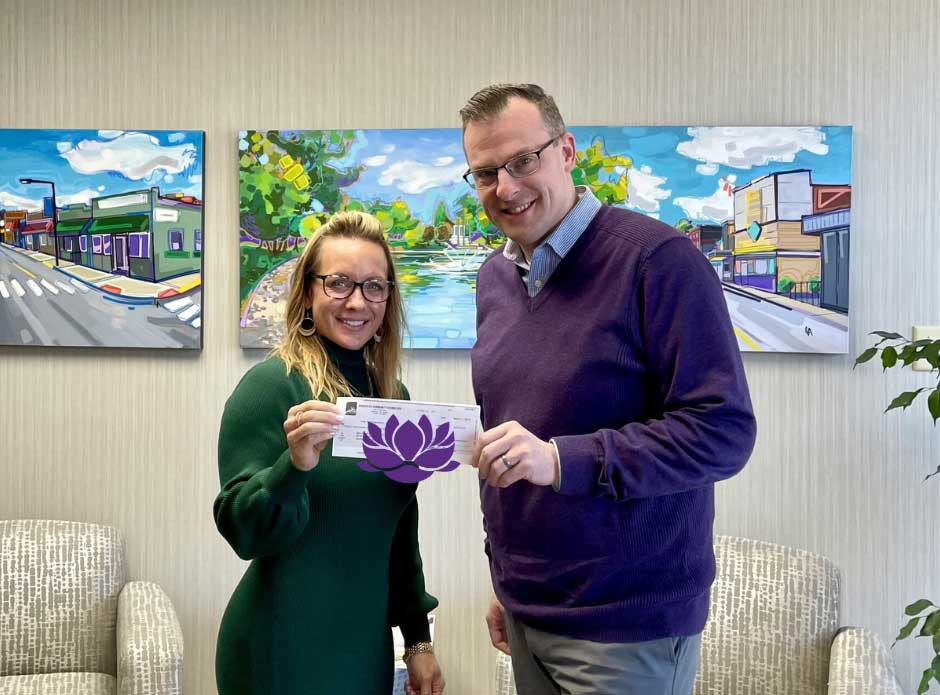 Main-Street-Barberton-Melanie-Black-Amato-and-Josh-Gordon Melanie Black of Main Street Barberton stands with Josh Gordon