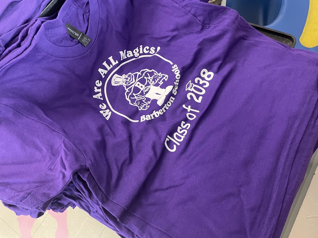 A purple t-shirt reading: We are ALL magics! Barberton Schools Class of 2038